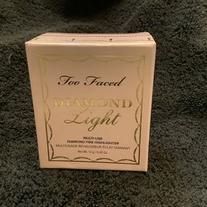 Two Faced multi-use diamond fire highlighter. .42 oz. NWOT